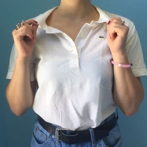 White Lacoste polo.